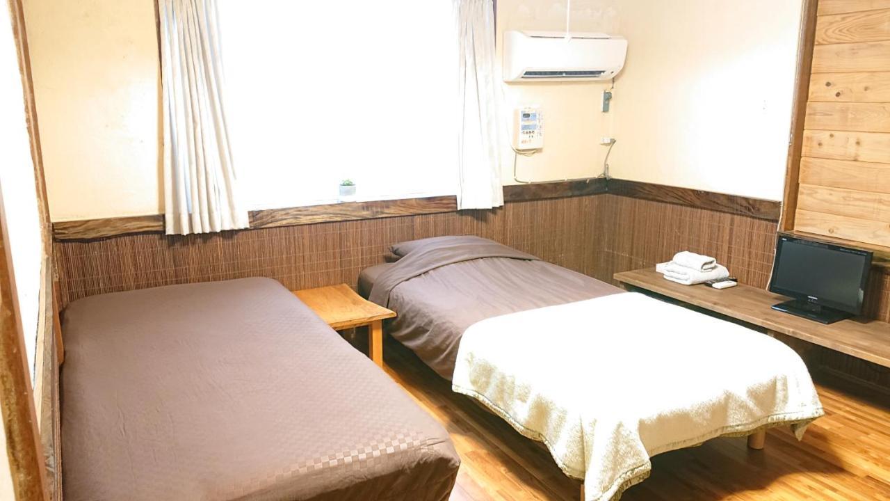 Hotel ペンションやいま日和 Ishigaki  Exterior foto